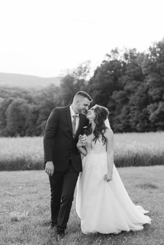 happy couple at gilbertsville farmhouse ny during their weekend wedding venue