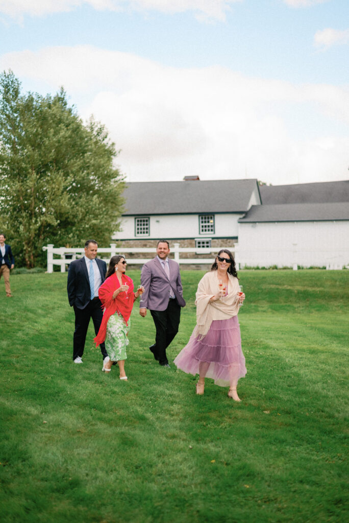 guests walking to finger lakes wedding ceremony